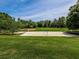 Community volleyball court and adjacent baseball field, fostering an active lifestyle for residents at 3822 Harris Nw Blvd, Kennesaw, GA 30144