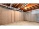 Unfinished basement showing cement flooring, insulated pipes, and potential for customization at 6335 Hampton Creek Dr, Cumming, GA 30041