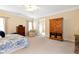 Bright and spacious Primary bedroom with neutral walls and plenty of space for bedroom furniture at 6335 Hampton Creek Dr, Cumming, GA 30041