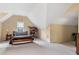 Spacious bedroom features vaulted ceilings, a dormer window, and plenty of natural light at 6335 Hampton Creek Dr, Cumming, GA 30041
