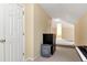 Bedroom area with view to additional room and features hardwood floors and ample natural light at 6335 Hampton Creek Dr, Cumming, GA 30041