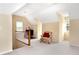 Bonus room features an open floor plan and seating at 6335 Hampton Creek Dr, Cumming, GA 30041