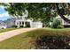 Beautifully designed home featuring a large front yard and a welcoming two-car garage at 6335 Hampton Creek Dr, Cumming, GA 30041