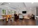 Finished basement boasts recessed lighting, a large screen TV, and a versatile layout at 6335 Hampton Creek Dr, Cumming, GA 30041