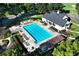 Beautiful aerial view of community pool offering ample lounge chairs and well-maintained landscape at 6335 Hampton Creek Dr, Cumming, GA 30041