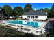 Enjoy this beautifully maintained pool with shaded seating areas and meticulously manicured landscaping at 6335 Hampton Creek Dr, Cumming, GA 30041