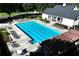 Enjoy a large community pool with ample lounge seating and well-maintained landscaping at 6335 Hampton Creek Dr, Cumming, GA 30041