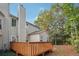 Exterior of the home highlighting the back porch, deck, and backyard at 810 Abbotts Mill Ct # 83, Duluth, GA 30097