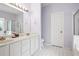 Bathroom featuring double vanity and shower at 810 Abbotts Mill Ct # 83, Duluth, GA 30097