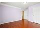 Bedroom with hardwood floors, large closet, and crown moulding at 810 Abbotts Mill Ct # 83, Duluth, GA 30097