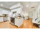 Bright, open kitchen with stainless steel appliances and butcher block island, ideal for cooking and entertaining at 875 White Sw St, Atlanta, GA 30310