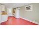 Functional kitchen with white cabinets, a stove, and a refrigerator at 875 White Sw St, Atlanta, GA 30310