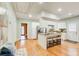 Spacious kitchen with island seating, stainless steel appliances, and seamless transition to living areas at 875 White Sw St, Atlanta, GA 30310