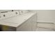 Clean laundry room featuring a white washer and dryer at 875 White Sw St, Atlanta, GA 30310