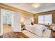 Comfortable main bedroom boasting an area rug, a large window, and stylish furnishings at 875 White Sw St, Atlanta, GA 30310