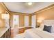 Well-lit main bedroom with hardwood floors, closets, and entry to the main bath at 875 White Sw St, Atlanta, GA 30310