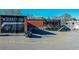 Ample parking lot near Whiskey Tour and Boxcar Hop City featuring an EV charging station at 875 White Sw St, Atlanta, GA 30310