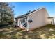Backyard with green grass and neutral siding at 1025 Lakeside Circle, Covington, GA 30016