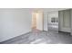 Spacious bedroom with mirrored closet doors and ample storage space at 1025 Lakeside Circle, Covington, GA 30016