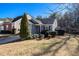 Charming home featuring a well-manicured lawn and inviting curb appeal under a clear blue sky at 1025 Lakeside Circle, Covington, GA 30016