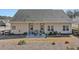 Spacious backyard featuring covered patio perfect for gatherings and enjoying outdoor living at 15 Azalea Lakes Ct, Dallas, GA 30157