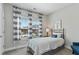Cozy bedroom with abundant natural light, neutral decor and relaxing furnishings, perfect for unwinding at 15 Azalea Lakes Ct, Dallas, GA 30157