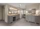 Expansive bathroom featuring dual sinks, a soaking tub, and a glass-enclosed shower for a spa-like experience at 9835 Trace Vly, Sandy Springs, GA 30350