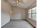 Spacious bedroom with vaulted ceiling, large window, and neutral walls and flooring at 2892 Norfair Ne Loop, Lithonia, GA 30038