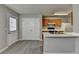 Cozy kitchen with grey walls, wood cabinets, and white countertops at 2892 Norfair Ne Loop, Lithonia, GA 30038