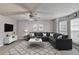Nicely staged living room featuring a comfortable sofa and patterned rug at 2892 Norfair Ne Loop, Lithonia, GA 30038