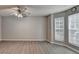 Spacious living room featuring new hardwood floors and bright windows with natural light at 2892 Norfair Ne Loop, Lithonia, GA 30038