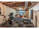 Unfinished basement converted into a home gym, complete with fitness equipment and rubber flooring at 363 Wilcrest Dr, Lawrenceville, GA 30044