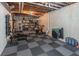 Unfinished basement converted into a home gym, complete with fitness equipment and rubber flooring at 363 Wilcrest Dr, Lawrenceville, GA 30044