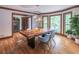 Dining room features a modern table, chairs, and a beautiful window view at 363 Wilcrest Dr, Lawrenceville, GA 30044