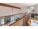 Open foyer with wood railing overlooks great room at 363 Wilcrest Dr, Lawrenceville, GA 30044