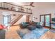 Spacious living room featuring a soaring ceiling, loft, and wood floors at 363 Wilcrest Dr, Lawrenceville, GA 30044