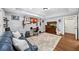 Finished basement featuring a comfortable seating area, desk, and entertainment center at 1125 Francis Ne St, Brookhaven, GA 30319