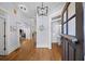 Spacious foyer with hardwood flooring, fresh paint and access to a half-bath at 1125 Francis Ne St, Brookhaven, GA 30319