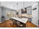 Modern kitchen with stainless steel appliances, a large island, and ample storage space at 1125 Francis Ne St, Brookhaven, GA 30319