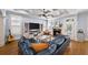 Bright living room featuring a coffered ceiling, fireplace, and hardwood floors at 1125 Francis Ne St, Brookhaven, GA 30319