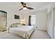 Inviting main bedroom with ceiling fan, neutral tones, and an en-suite bathroom at 235 Chicopee Ne Dr, Marietta, GA 30060