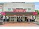 Historic Strand Theater with a grand facade, inviting entrance, and architectural details showcasing artistic heritage at 235 Chicopee Ne Dr, Marietta, GA 30060