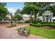 Scenic park view with manicured lawns, a gazebo, mature trees, and a relaxing bench, perfect for leisurely afternoons at 235 Chicopee Ne Dr, Marietta, GA 30060