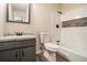 Bathroom featuring a bathtub with shower and updated single sink vanity at 6354 Shannon Pkwy # 15D, Union City, GA 30291