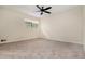 Cozy bedroom featuring neutral paint, carpet flooring, and a ceiling fan at 6354 Shannon Pkwy # 15D, Union City, GA 30291