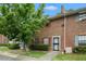 Charming brick townhome with decorative shutters, security door and beautiful landscaping at 6354 Shannon Pkwy # 15D, Union City, GA 30291