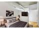 Comfortable bedroom with a cozy bed, stylish wall decor, and a minimalist design for relaxation at 943 Peachtree Ne St # 1003, Atlanta, GA 30309