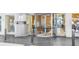 Elegant building entrance with a revolving door and modern architecture, showcasing the Metropolis sign at 943 Peachtree Ne St # 1003, Atlanta, GA 30309