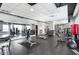 Well-equipped gym with weights, machines, mirrors, and ample workout space at 943 Peachtree Ne St # 1003, Atlanta, GA 30309