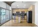 Modern kitchen with stainless steel appliances, plenty of cabinet space and hardwood floors at 943 Peachtree Ne St # 1003, Atlanta, GA 30309